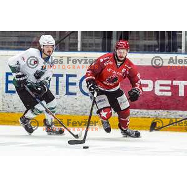 Janez Orehek and Blaz Tomazevic in action during Final of Slovenian National Ice-Hockey Championship between SIJ Acroni Jesenice and SZ Olimpija in Podmezakla Hall, Jesenice on April 23, 2019