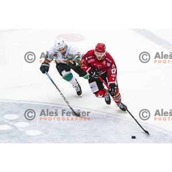 Nik Simsic and Mathieu Gagnon in action during Final of Slovenian National Ice-Hockey Championship between SIJ Acroni Jesenice and SZ Olimpija in Podmezakla Hall, Jesenice on April 23, 2019