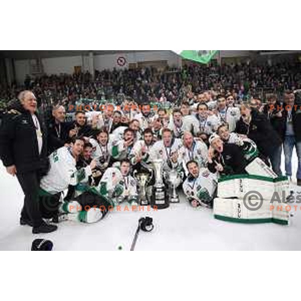 Ales Music, Gal Koren and players of SZ Olimpija celebrate title in Slovenian ice-hockey League after final match between SZ Olimpija and SIJ Acroni Jesenice in Tivoli Hall, Ljubljana, Slovenia on April 25, 2019
