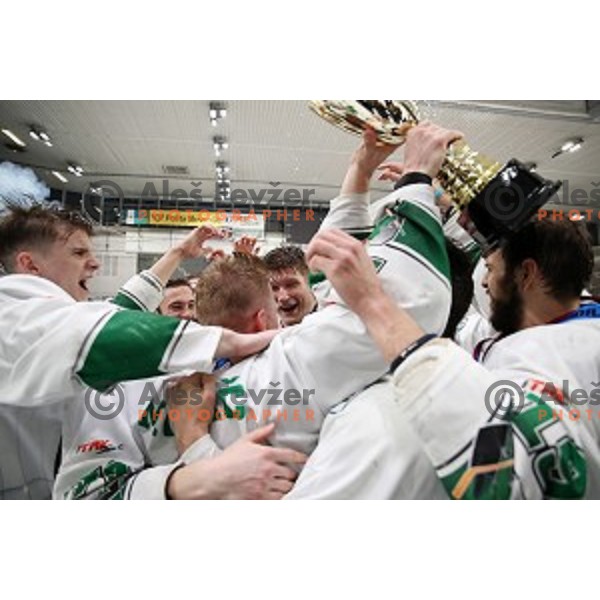 Ales Music, Gal Koren and players of SZ Olimpija celebrate title in Slovenian ice-hockey League after final match between SZ Olimpija and SIJ Acroni Jesenice in Tivoli Hall, Ljubljana, Slovenia on April 25, 2019