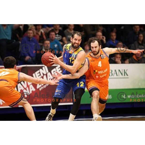 Sandi Cebular and Nikola Gajic in action during Nova KBM league playoff basketball match between Helios Suns and Hopsi Polzela in Domzale Sports Hall, Slovenia on May 4, 2019