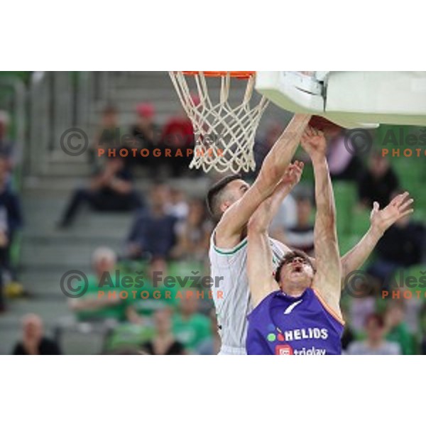 Erjon Kastrati and Nejc Klavzar in action during semi-final of Nova KBM league basketball match between Petrol Olimpija and Helios Suns in Stozice, Ljubljana, Slovenia on May 11, 2019