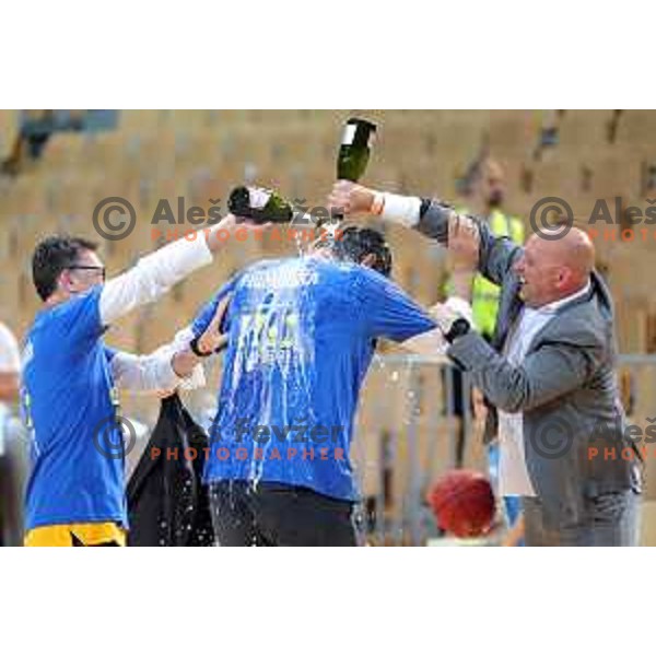 Jurica Golemac washed with sparkling wine from Klemen Pur after third game of The Final of Nova KBM League basketball match between Sixt Primorska and Petrol Olimpija in Bonifika Arena,Koper, Slovenia on May 24, 2019
