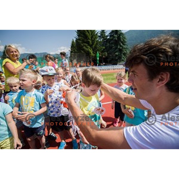 Zan Kosir, Slovenian olympic medalist in parallel snowboard during Olympic day with school children in Krize, Slovenija on June 12, 2019