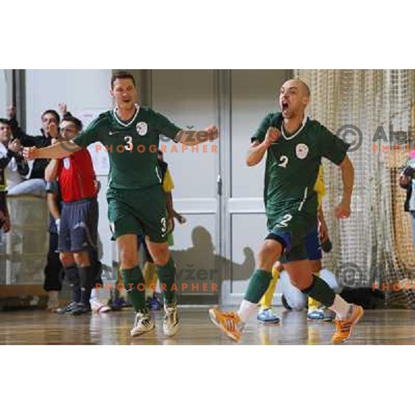 Kragelj (30) and Osojnik (2) celebrate goal at friendly futsal match Slovenia-Brasil in Hala Tivoli, Ljubljana, Slovenia on 21.2.2008. Brasil won 6:3 (5:1) in front of 4000 spectators. 