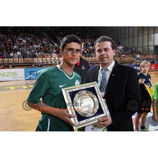 Milivoje Simeunovic (10) receives trophy before friendly futsal match Slovenia-Brasil in Hala Tivoli, Ljubljana, Slovenia on 21.2.2008. Brasil won 6:3 (5:1) in front of 4000 spectators. 