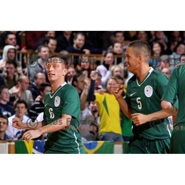 Drobnic (6) and Ibrisimovic (5) celebrate goal at friendly futsal match Slovenia-Brasil in Hala Tivoli, Ljubljana, Slovenia on 21.2.2008. Brasil won 6:3 (5:1) in front of 4000 spectators. 