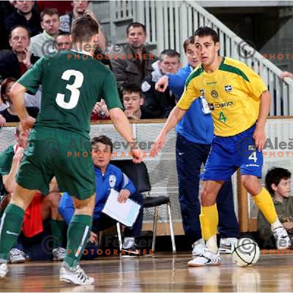 Kragelj (3) and Neto (4) at friendly futsal match Slovenia-Brasil in Hala Tivoli, Ljubljana, Slovenia on 21.2.2008. Brasil won 6:3 (5:1) in front of 4000 spectators. 