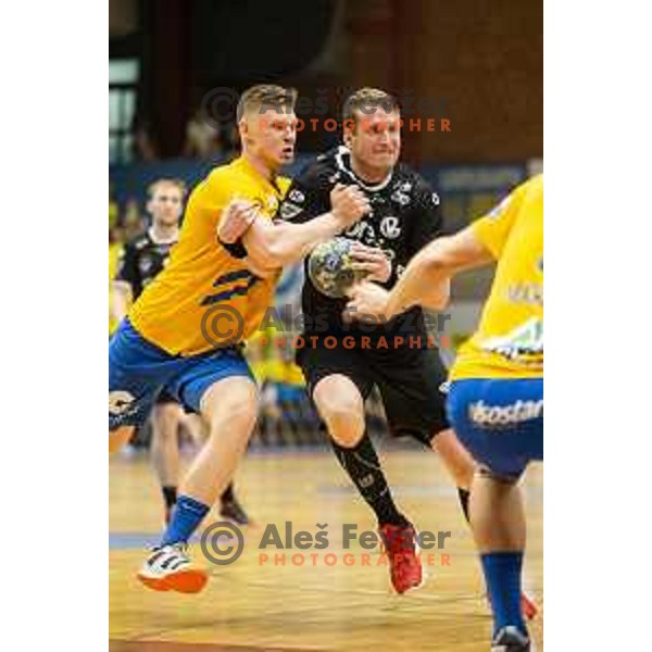 Kristjan Horzen vs David Miklavcic in action during Slovenian Supercup handball match between Gorenje Velenje and Celje Pivovarna Lasko in Slovenj Gradec, Slovenia on August 30, 2019