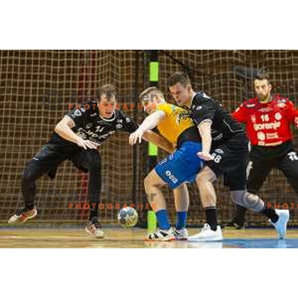 Vid Levc and Grega Oklescen vs Kristjan Horzen in action during Slovenian Supercup handball match between Gorenje Velenje and Celje Pivovarna Lasko in Slovenj Gradec, Slovenia on August 30, 2019