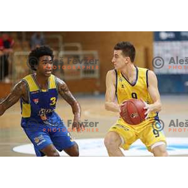 Anthony Collins and Nejc Baric in action during Slovenian Super Cup basketball match between Koper Primorska and Hopsi Polzela in Podcetrtek Sports Hall, Slovenia on September 17, 2019