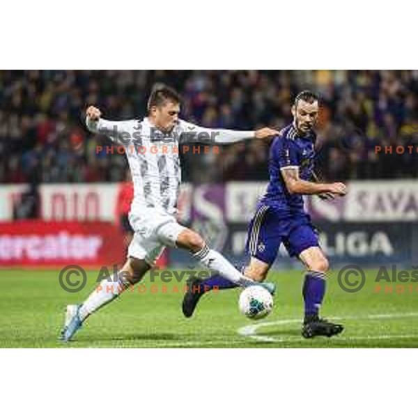 Amadej Marosa vs Denis Klinar in action during Prva liga Telekom Slovenije football match between Maribor and Mura in Ljudski vrt, Maribor, Slovenia on October 5, 2019