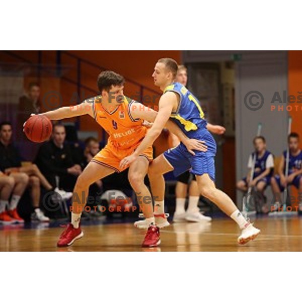 Aljaz Bratec and Nejc Martincic in action during 1.SKL basketball match between Helios Suns and Sencur GGD in Domzale Sports Hall, Slovenia on October 5, 2019