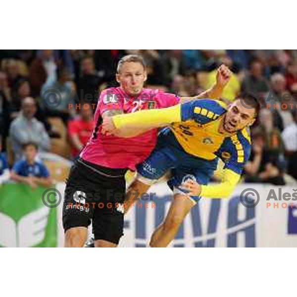 Tilen Kodrin and Tilen Sokolic in action during 1.NLB league handball match between Koper and Celje Pivovarna Lasko in Bonifika Hall, Koper, Slovenia on October 16, 2019