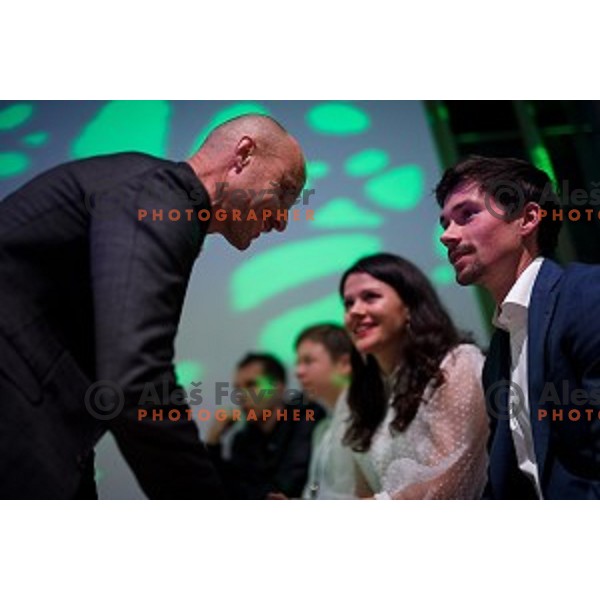 Tomaz Grm talks with Primoz Roglic and his wife during Night of the Cycling stars 2019 at Ljubljana Castle, Ljubljana, Slovenia on November 26, 2019