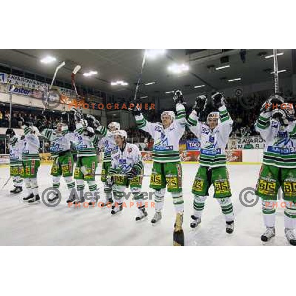 ZM Olimpija players celebrate victory at sixth ice-hockey game of semi-final of EBEL league between ZM Olimpija- Black Wings Linz in Hala Tivoli, Ljubljana 9.3.2008. ZM Olimpija won the game 2:0 and series 4:2 and advanced to final. Photo by Ales Fevzer 