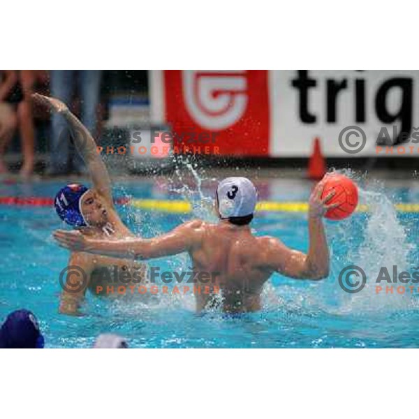 Kalan (11) tries to block Borsos at match Triglav (SLO)- UTE (Hungary) in semi-final of Alpe Adria water polo league tournament in Kranj 9.3.2008. UTE won the match 10:6 and advanced to final. Photo by Ales Fevzer 