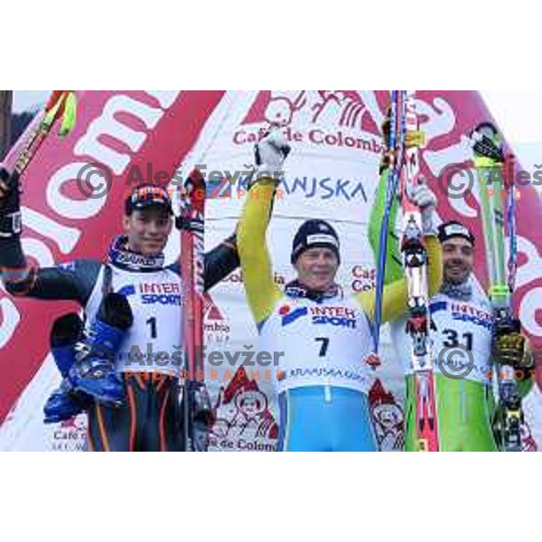 Benjamin RAICH, winner Fredrik NYBERG and Uros Pavlovcic, third placed at FIS Alpine World Cup Giant Slalom for Vitranc Cup in Kranjska gora, Slovenia on December 20 , 2001