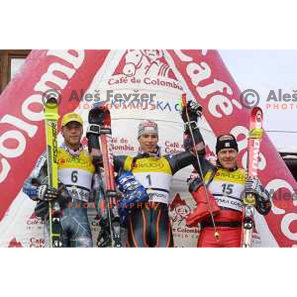 Bode Miller, second placed ,winner Benjamin Raich and Didier Cuche, third placed at FIS Alpine World Cup Giant Slalom for Vitranc Cup in Kranjska gora, Slovenia on December 21 , 2001