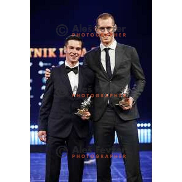 cyclist Primoz Roglic with trophy for Sportsman of the year 2019 and Tine Urnaut, captain of Volleyball team with trophy for the best team in Ljubljana on December 17, 2019