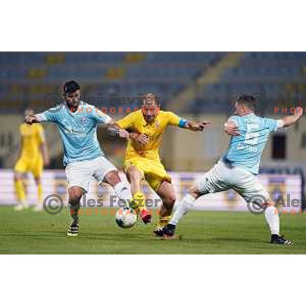 Rok Kronaveter, Senijad Ibricic and Aleks Pihler in action during Prva Liga Telekom Slovenije 2019/2020 football match between Domzale and Maribor in Domzale, Slovenia on June 7 , 2020