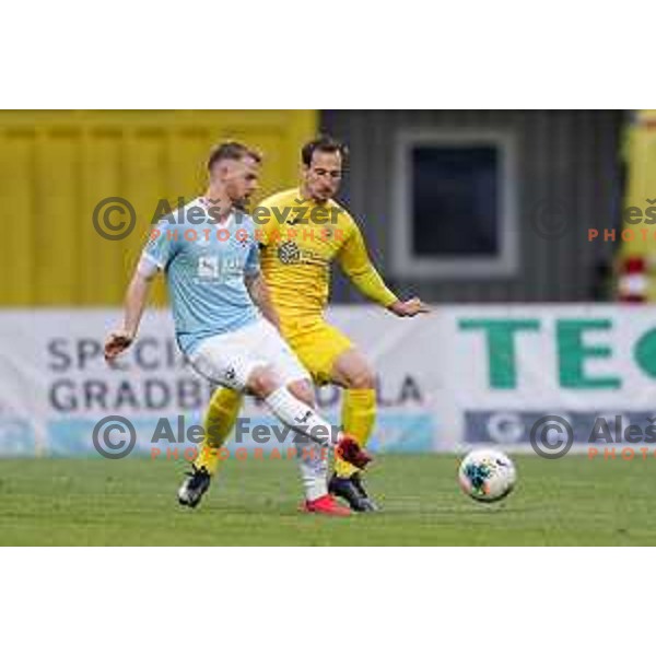Rudi Pozeg Vancas and Matic Fink in action during Prva Liga Telekom Slovenije 2019/2020 football match between Domzale and Maribor in Domzale, Slovenia on June 7 , 2020