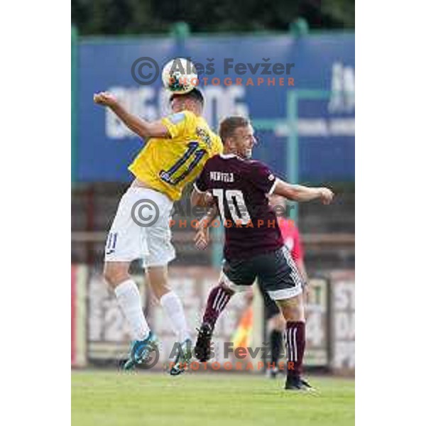 Roko Baturina and Ales Mertelj in action during Prva Liga Telekom Slovenije 2019/2020 football match between Bravo and Triglav in Ljubljana, Slovenia on June 7 , 2020