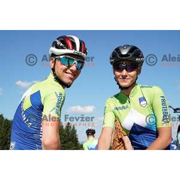 Tadej Pogacar and Urska Zigart of Slovenia National Cycling team posing in new team jerseys during morning practice at Krvavec, Slovenia on July 2, 2020
