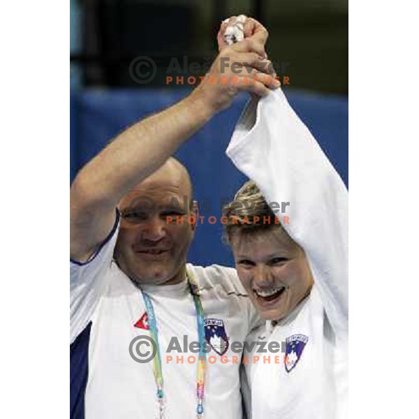 Coach Marjan Fabjan and Urska Zolnir of Slovenia, Olympic bronze medalist in Judo category -63 kg at 2004 Summer Olympic games in Athens, Greece on August 17, 2004