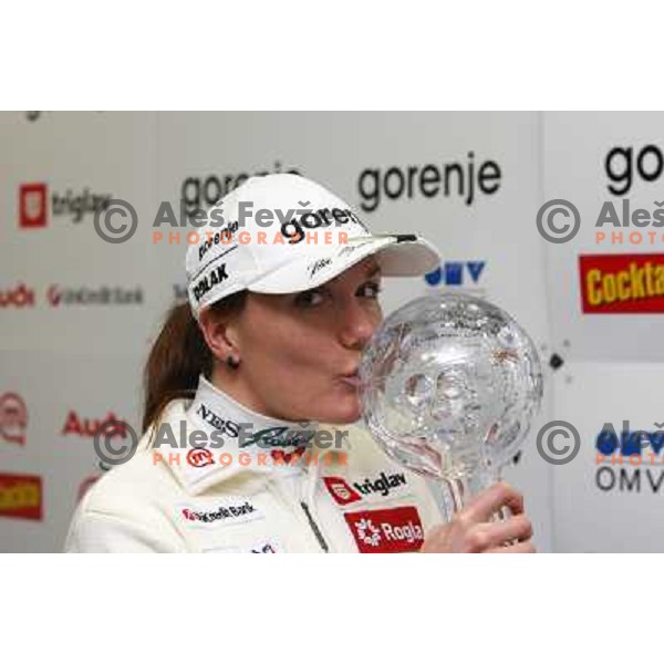 Petra Majdic, winner of FIS Nordic Cross country sprint overall standings for season 2007-2008 kisses the award at press conference in Ljubljana, Slovenia 17.3.2008. 
