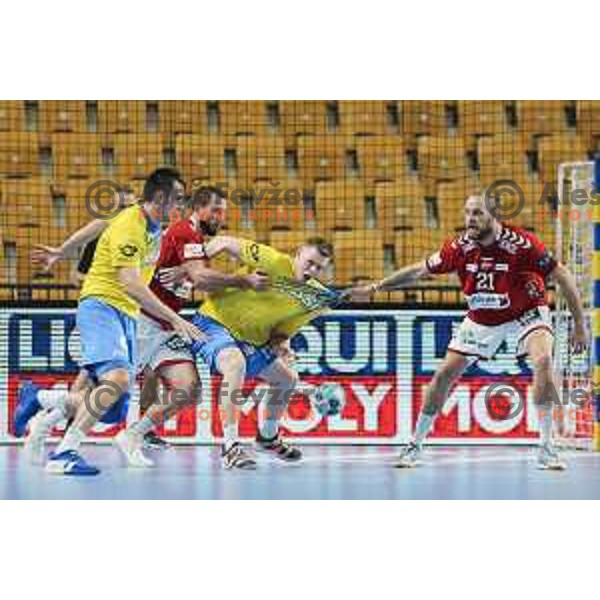 Josip Sarac and Kristjan Horzen in action during EHF Champions League handball match between Celje Pivovarna Lasko and Aalborg in Arena Zlatorog, Celje, Slovenia on September 16, 2020