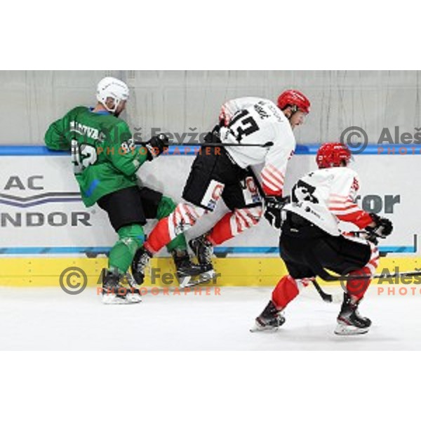 Aleksandar Magovac and Mirko Djumic in action during semi-final of Slovenian Ice-Hockey Cup between SZ Olimpija and SIJ Acroni Jesenice in Tivoli Hall, Ljubljana, Slovenia on September 18, 2020
