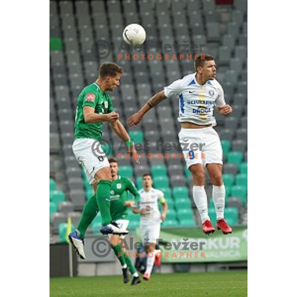 Uros Korun and Roman Bezjak in action during Prva Liga Telekom Slovenije 2020-2021 football match between Olimpoija and Celje in SRC Stozice, Ljubljana, Slovenia on October 18, 2020
