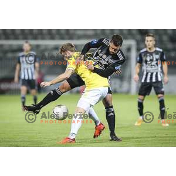Amadej Marosa vs Jan Repas in action during Prva liga Telekom Slovenije football match between Mura and Maribor in Fazanerije, Murska Sobota, Slovenia on October 29, 2020