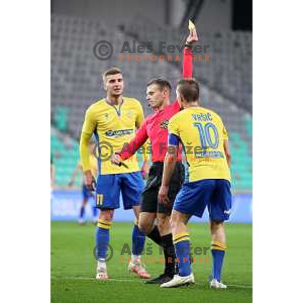 Referee David Smajc shows yellow card to Dare Vrsic during Prva Liga Telekom Slovenije 2002-2021 football match between Olimpija and Koper in SRC Stozice, Ljubljana, Slovenia on November 7, 2020