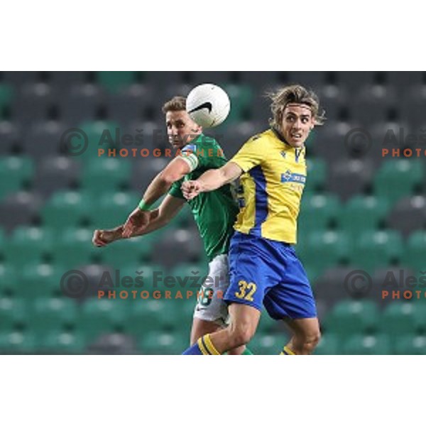 Uros Korun and Claudio Spinelli in action during Prva Liga Telekom Slovenije 2002-2021 football match between Olimpija and Koper in SRC Stozice, Ljubljana, Slovenia on November 7, 2020
