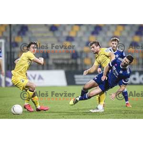 Janez Pisek vs Rok Kronaveter in action during Prva liga Telekom Slovenije football match between Maribor and Domzale in Ljudski vrt, Maribor, Slovenia on November 7, 2020