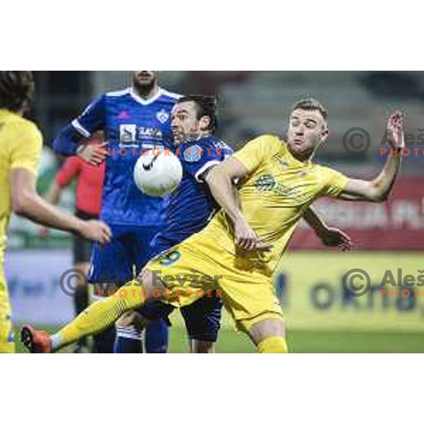 Denis Klinar vs Vuk Slobodan in action during Prva liga Telekom Slovenije football match between Maribor and Domzale in Ljudski vrt, Maribor, Slovenia on November 7, 2020