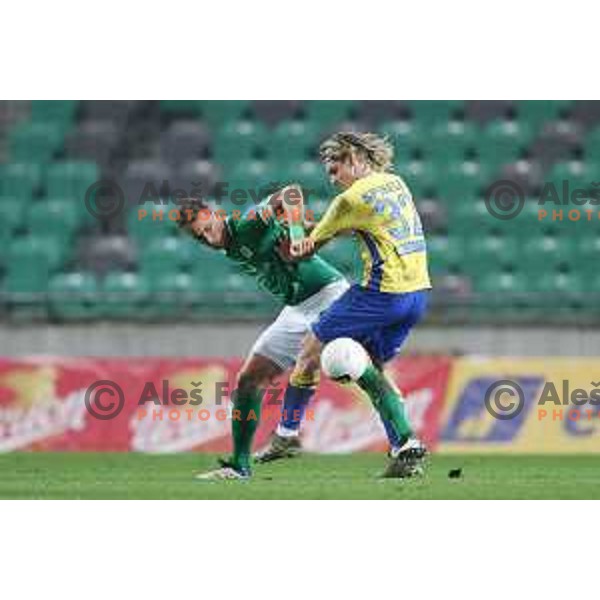 Uros Korun and Claudio Spinelli in action during Prva Liga Telekom Slovenije 2002-2021 football match between Olimpija and Koper in SRC Stozice, Ljubljana, Slovenia on November 7, 2020