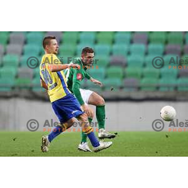 Dare Vrsic and Timi Max Elsnik in action during Prva Liga Telekom Slovenije 2002-2021 football match between Olimpija and Koper in SRC Stozice, Ljubljana, Slovenia on November 7, 2020