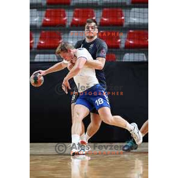Matej Arih and Zan Grojzdek in action during 1.NLB league handball match between MRK Ljubljana and Trimo Trebnje in Kodeljevo Hall, Ljubljana, Slovenia on November 14, 2020