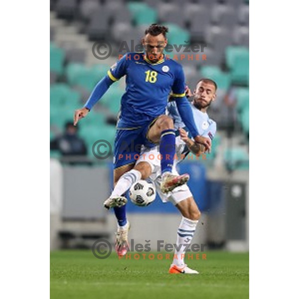 Vedat Muriqi and Miha Blazic of Slovenia in action during UEFA Nations League 2021 football match between Slovenia and Kosovo in SRC Stozice, Ljubljana on November 15, 2020