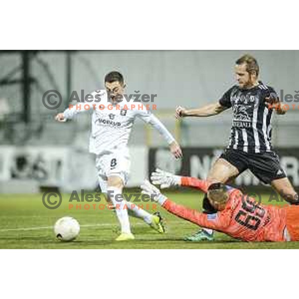 Mario Kvesic vs Jure Travner and Matko Obradovic in action during Prva liga Telekom Slovenije football match between Mura and Olimpija in Fazanerija, Murska Sobota, Slovenia on November 21, 2020
