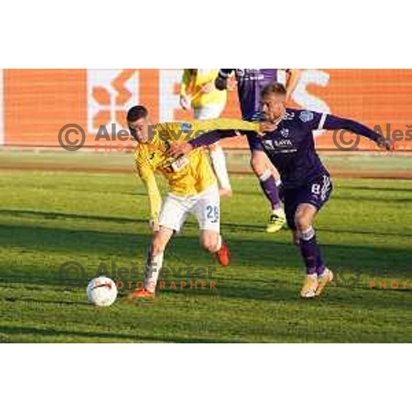Rok Maher and Alexandru Cretu in action during Prva Liga Telekom Slovenije 2020-2021 football match between Bravo and Maribor in Ljubljana, Slovenia on November 21, 2020