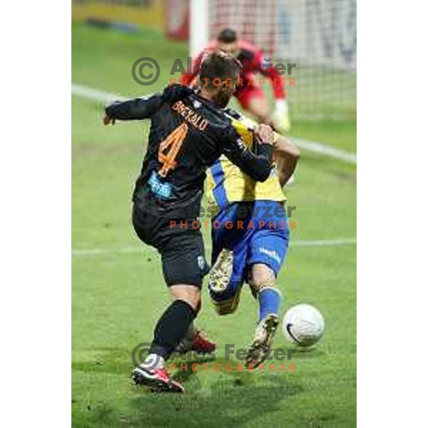 David Brekalo sacks Dare Vrsic during Prva Liga Telekom Slovenije 2020-2021 football match between Koper and Bravo at Bonifika, Koper on November 24, 2020