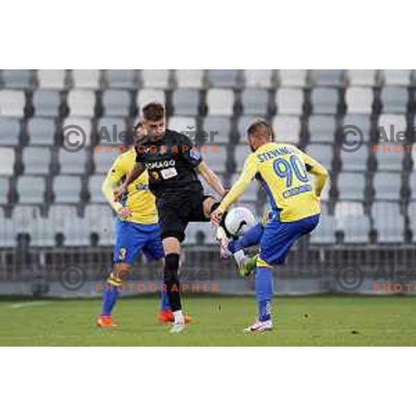 Nino Zugelj and Stefan Stevanovic in action during Prva Liga Telekom Slovenije 2020-2021 football match between Koper and Bravo at Bonifika, Koper on November 24, 2020