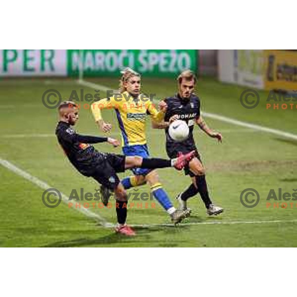 Almin Kurtovic and Claudio Spinelli in action during Prva Liga Telekom Slovenije 2020-2021 football match between Koper and Bravo at Bonifika, Koper on November 24, 2020