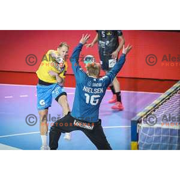 Tilen Kodrin vs Emil Nielsen in action during EHF Champions League handball match between Celje Pivovarna Lasko and Nantes in Zlatorog Arena in Celje, Slovenia on November 25, 2020