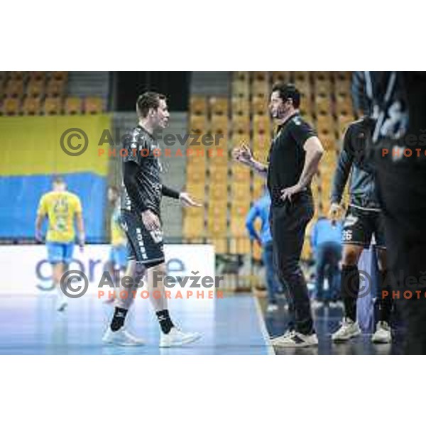 Rok Ovnicek and Alberto Entrerrios Rodriguez, head coach of Nantes in action during EHF Champions League handball match between Celje Pivovarna Lasko and Nantes in Zlatorog Arena in Celje, Slovenia on November 25, 2020