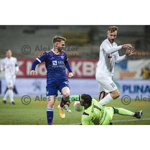 Rudi Vancas Pozeg vs Jan Koprivec in action during Prva liga Telekom Slovenije football match between Maribor and Tabor in Ljudski vrt, Maribor, Slovenia on November 28, 2020